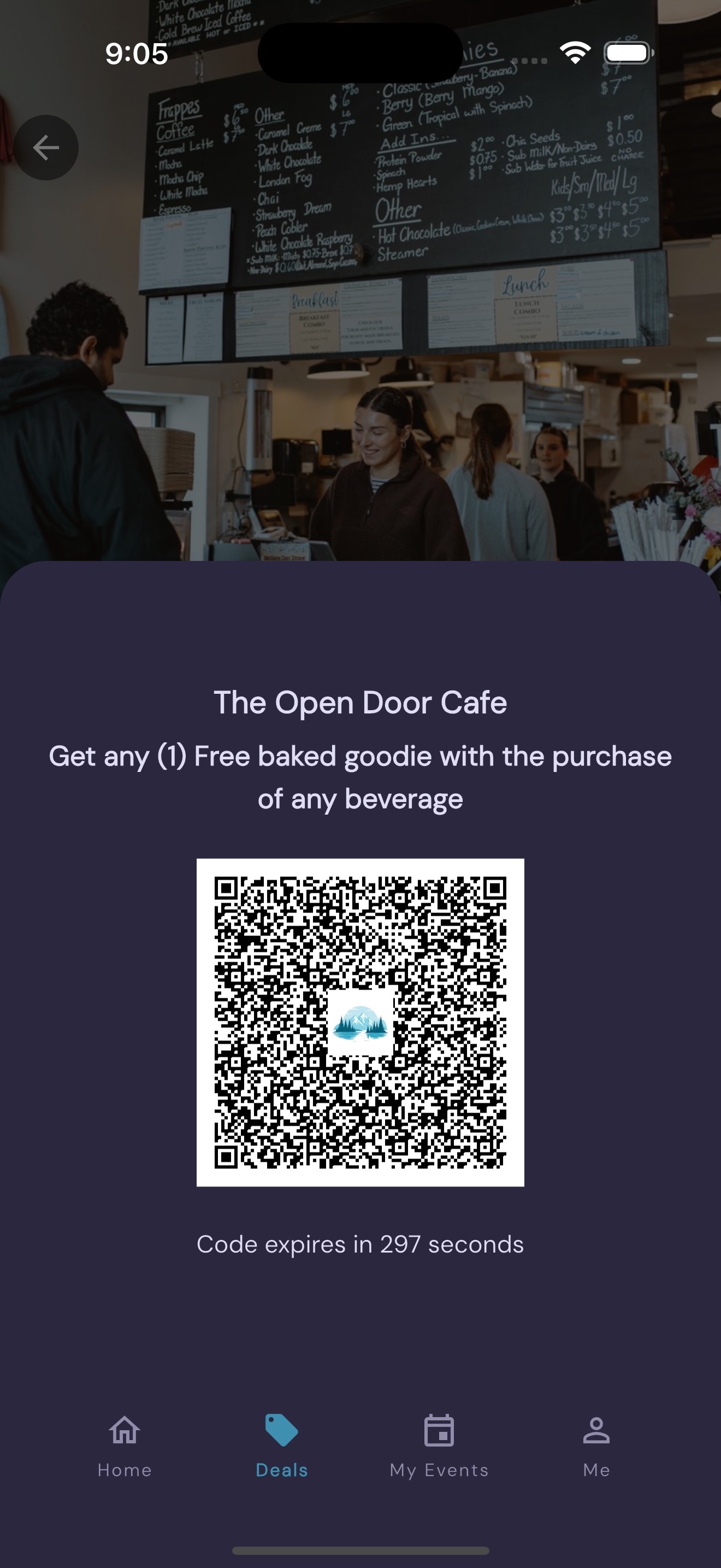 A phone displaying the QR code for redemption
